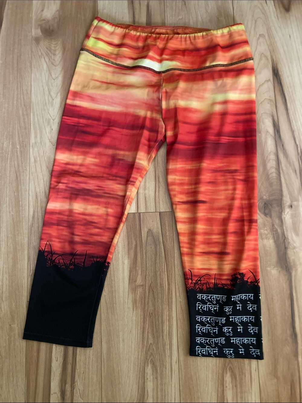 Limited Edition Onzie capri leggings in the "India Fields"  sunset design